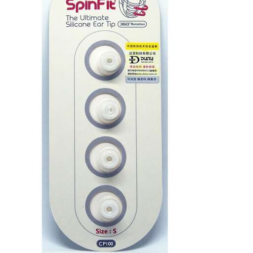 a white and black remote control with buttons on it.