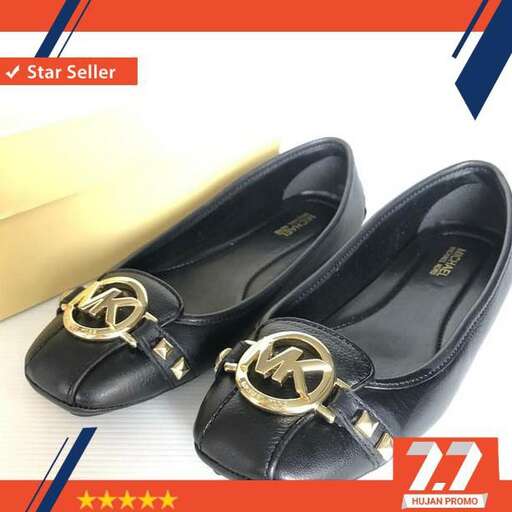 black leather dress shoes with gold trim.
