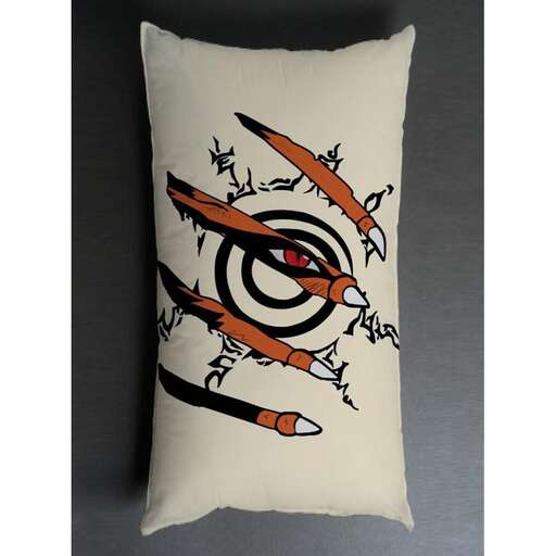 a pair of embroidered embroidered embroidered embroidered circles on a cushion.