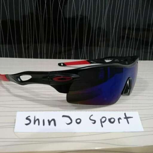 a pair of sunglasses with a sign saying 