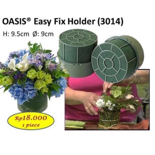 a person holding a pot of flowers in it