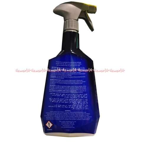 a bottle of oil with a blue label