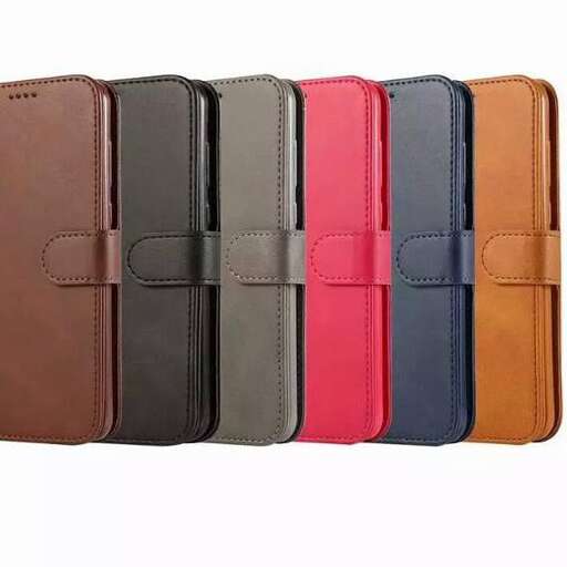 a brown and black case is lined up with a blue strap.