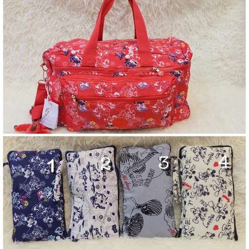 a red and blue bag with a floral print.