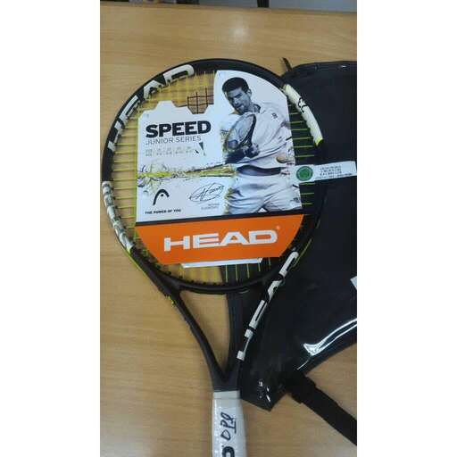 a tennis racket with a picture of a man on it.