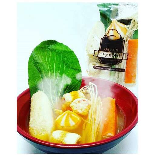 a bowl of food with a drink in it.