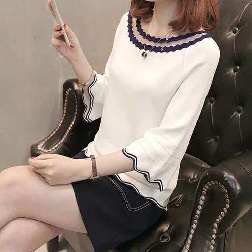 a white blouse with a blue skirt and a black skirt