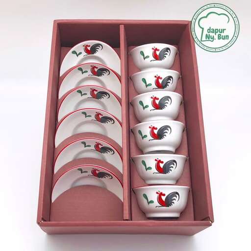 the little red and white boxes are in a box.