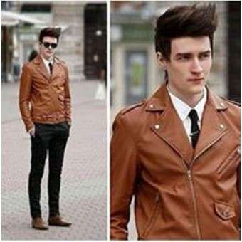 a man in a leather jacket and a tie