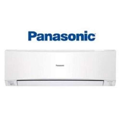 a white refrigerator freezer sitting on top of a white wall.