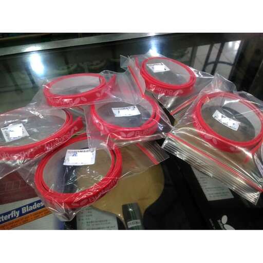 a bunch of plastic bags are stacked on a shelf.