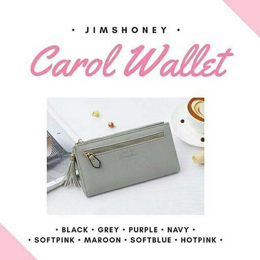 a small purse with a black case on top of it.