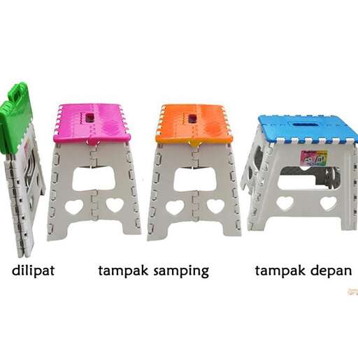 a set of three different toy houses sitting on top of a table.