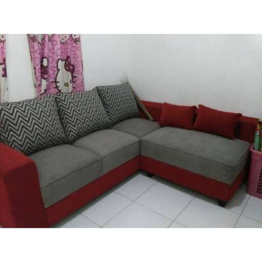 a couch with a red and grey color scheme.