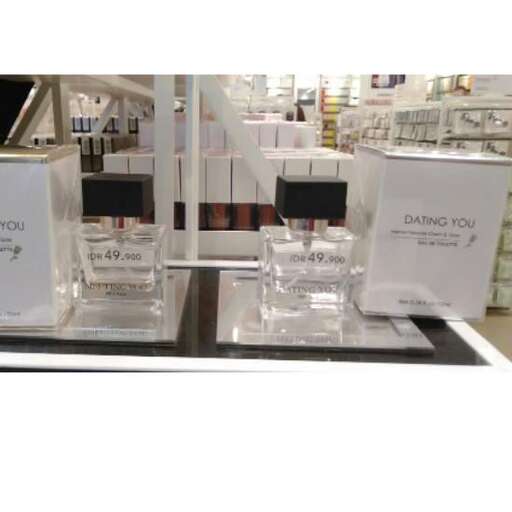 a display case with bottles of liquor on it.