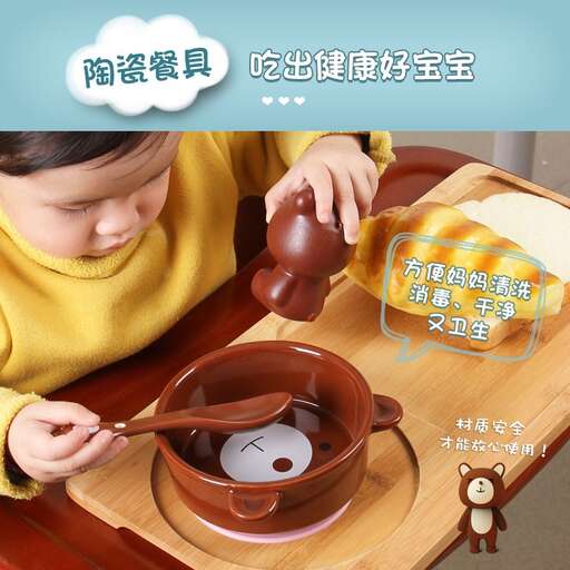a child sitting at a table with a bowl of chocolate.