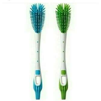 two brushes are shown with blue and green bristles.