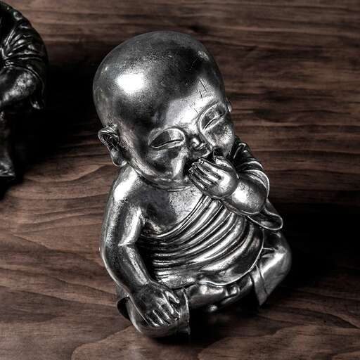 black and white photo of a baby with a skull