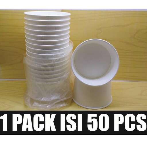 a stack of cups and a cup on a table.
