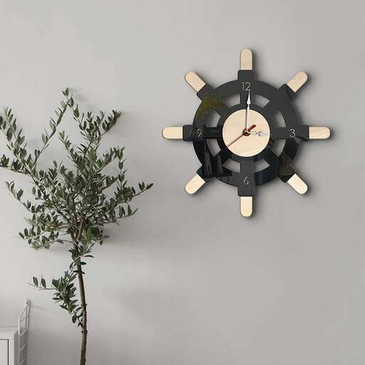 a wall clock with a plant inside