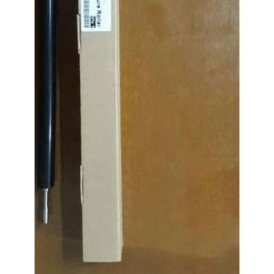 a black and white box sitting on top of a wooden floor.