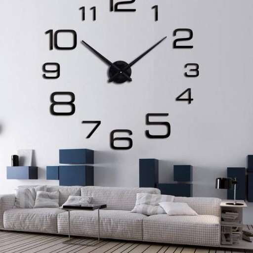 a living room with a couch, couch, and a clock.