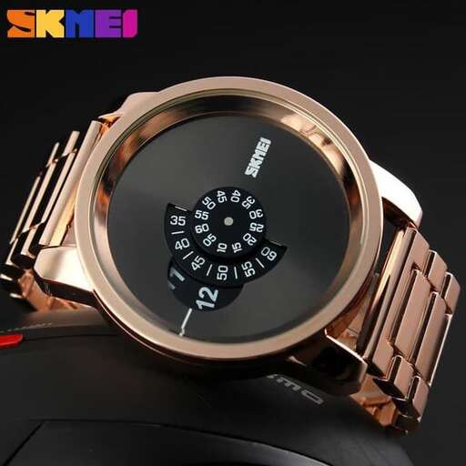 the watch is made of gold and has a black dial and a red leather strap.