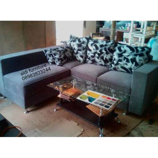 a couch with a coffee table and a coffee table.
