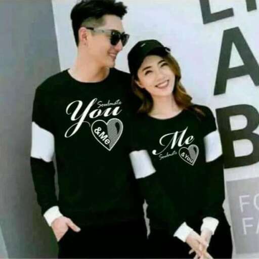 person and his girlfriend, are all smiles in their new t - shirts.