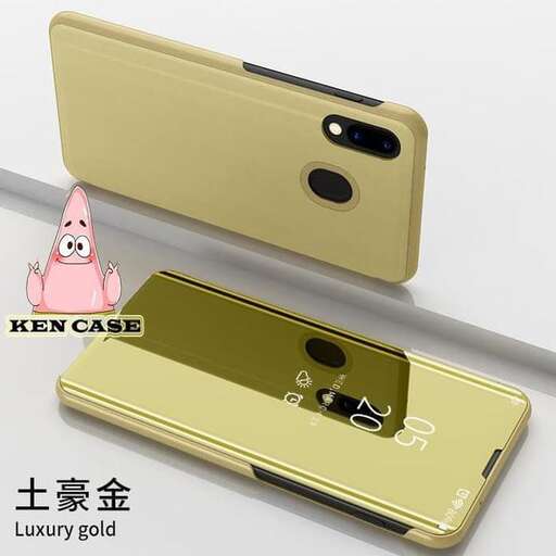 a gold cell phone case with a pink case.