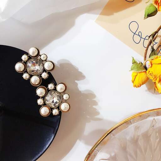 a close up of a bracelet and bracelet on a table