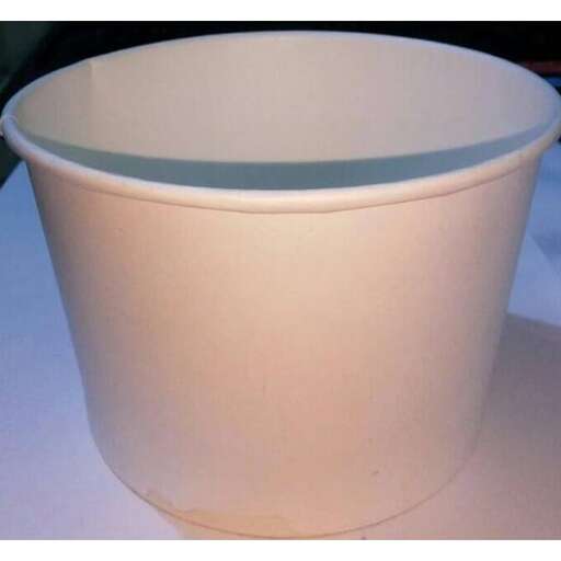 a large white bowl on a table