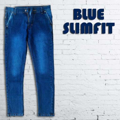 a pair of blue jeans with a white brick wall