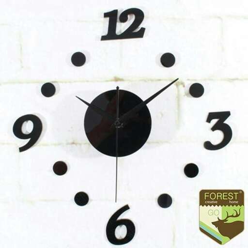 a clock with black numbers and a white face.