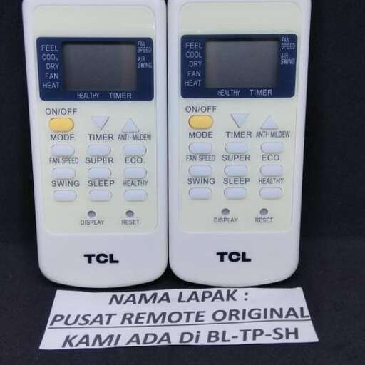 two white cell phones with a black background.