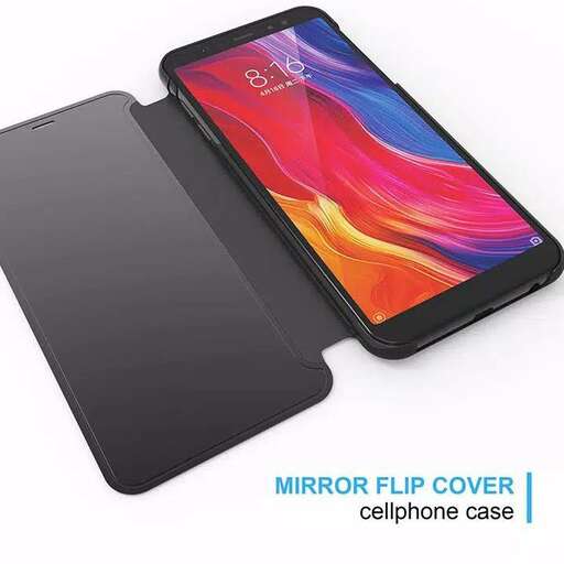 a cell phone that is sitting on a table.