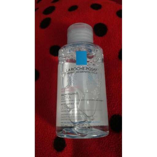 a bottle of water with a blue lid