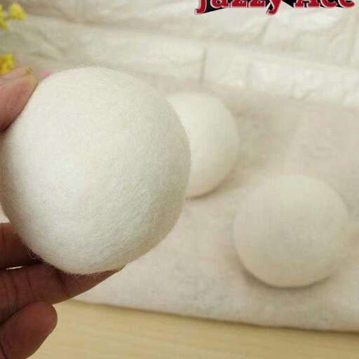 a person holding a white ball of white powder.