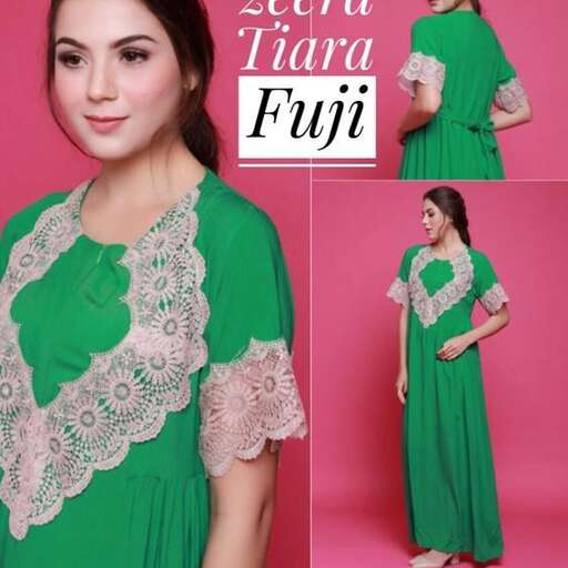 this is a beautiful green dress with lace trim.