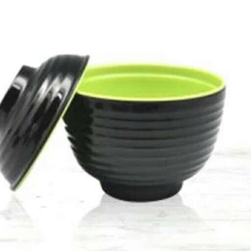 a bowl made of black plastic.