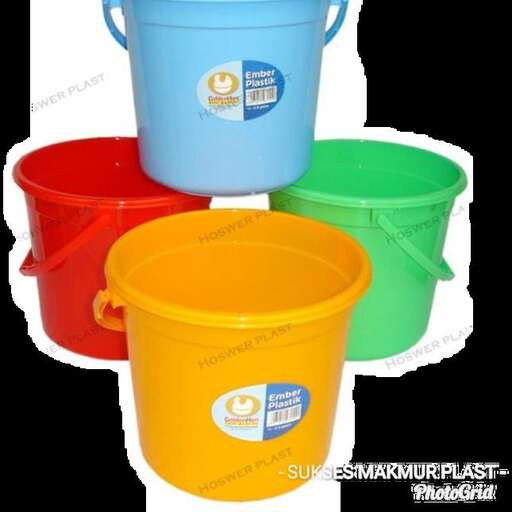 a set of three buckets with colored plastic buckets.
