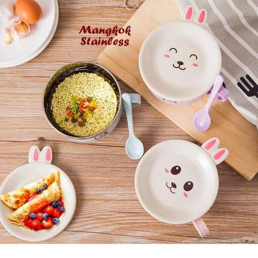 a table with plates of food and cups of food