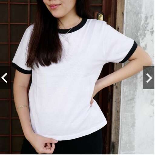 white tee with black trim and black trim.