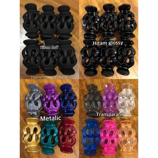 a collection of black glass beads