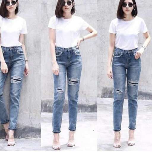 a white tee is worn with jeans and a white t - shirt.