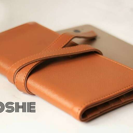 a leather wallet with a leather strap.