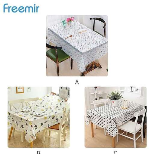 a table with a tablecloth and a flower arrangement.