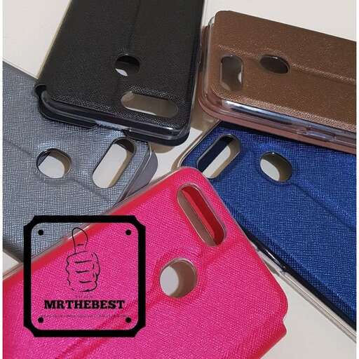 a pink cell phone with a blue cover and a pink case.