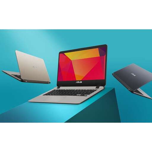 a laptop computer and a laptop on a blue table.