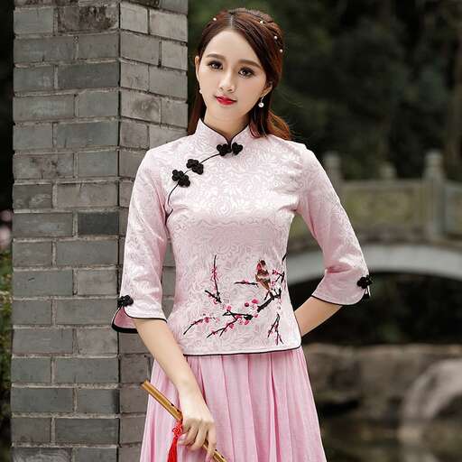 pink dress with a black bow